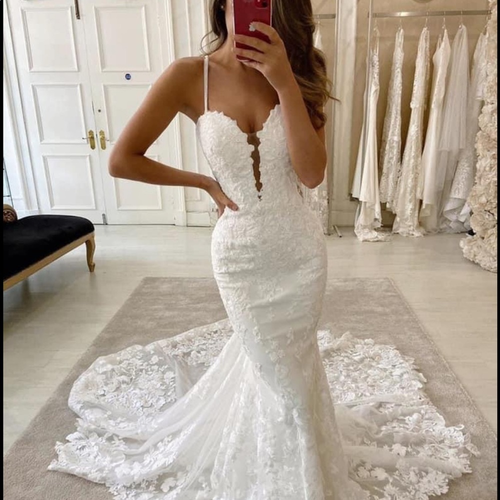 Martina Liana Wedding Gown. Style 1103. Slight alternation
